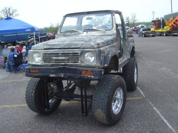 No $7,000 lift kit to squeeze 35's on this Samurai. Try $22 in Home Depot steel...that's using your head??? 